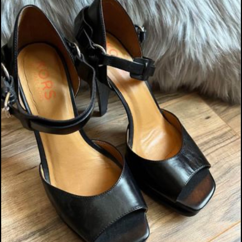 Beautiful Michael Kors platform. Used only a few times. Soft leather comfortable